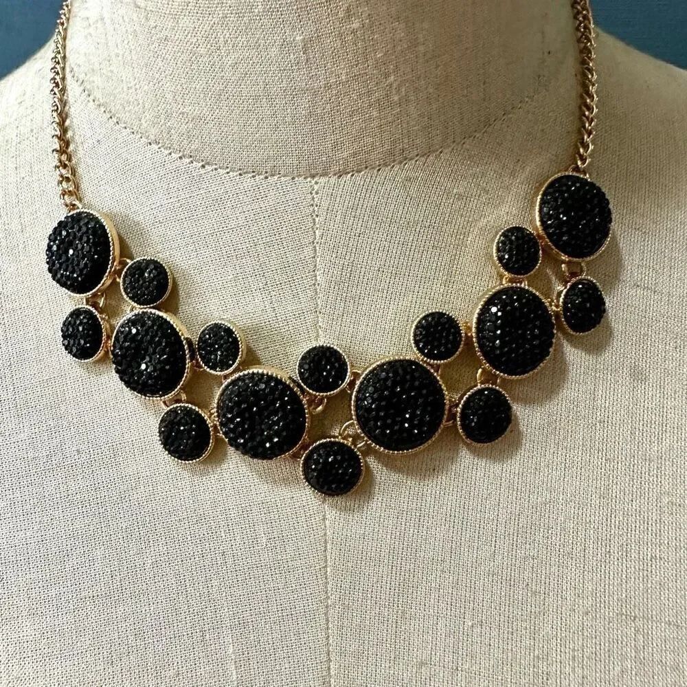 Black and gold tone statement necklace
